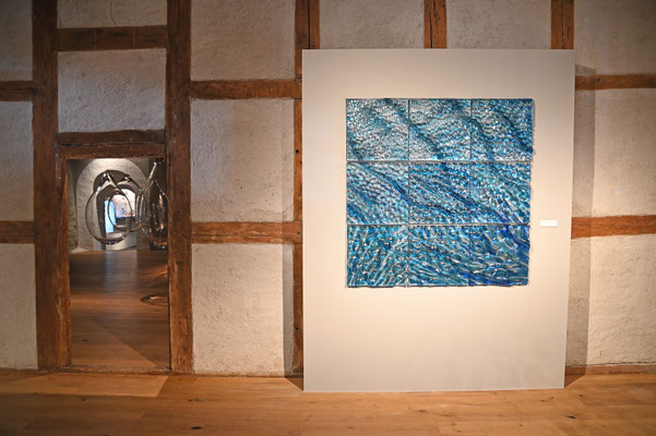 Glass installation of 9 Wallpanels with texture of an Ice Cave