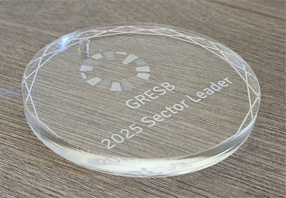 Medaille van plexiglas gemaakt met logo