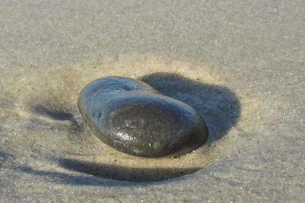 Pebble im Sand