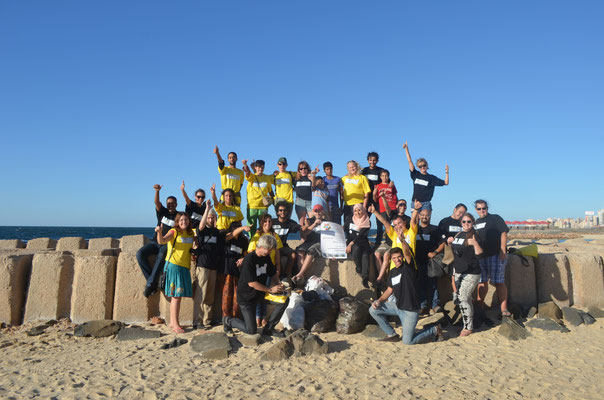 Group photo at the coast of Mediterranean sea, after the clean up