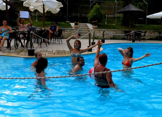 Participants demonstrating their show for competition of water aerobics shows