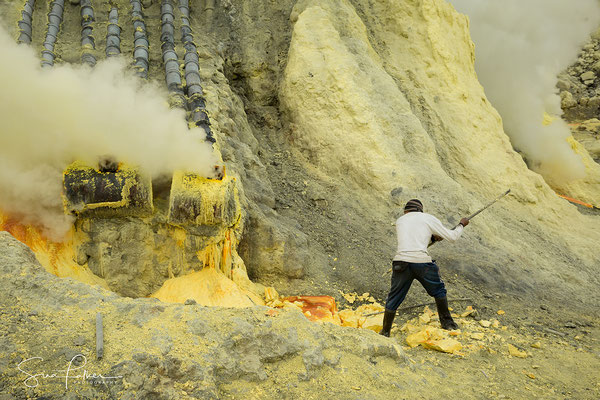 Sulfur mining in the crater of Ijen