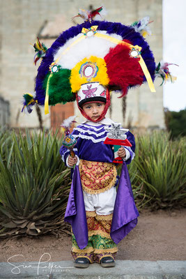 Boy in traditional costume Danza de la Pluma