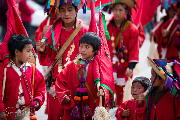 Red robes at carnival in Chiapas