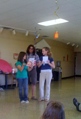 Kids reading scripts from Laurie Allen's books at the Permian Playhouse in Odessa, TX