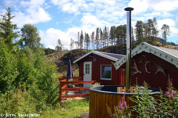 Ferienhütte mit Badestamp