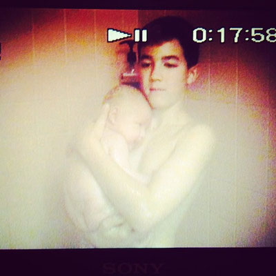 Kevin showering with a teeny tiny baby Frankie, the youngest Jonas