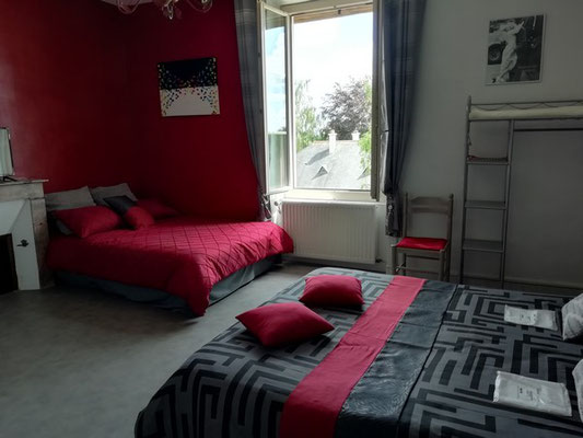 room with 2 double beds