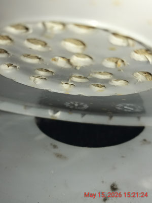 Bottom of Bucket #1 - holes drilled in a circular footprint to interface with the lid of Bucket #2