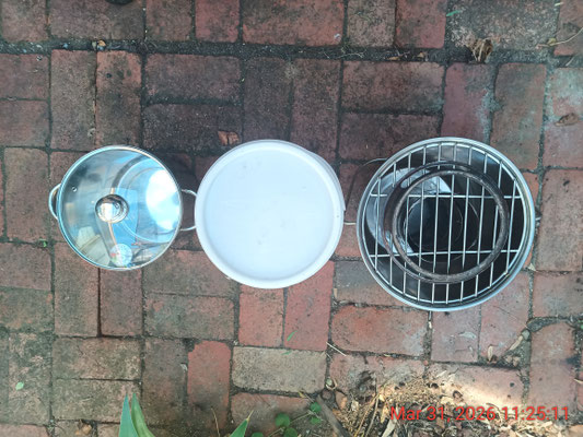 L to R: 7.6 litre stainless stockpot, 2 x 5L PE containers, 12L stainless bucket with burner, round grill and wok ring