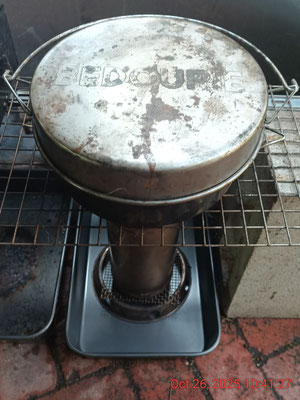 "Navigator Kitchen" besser block and mesh stovetop with 5" Navigator Burner and "Bedourie" on top for cooking