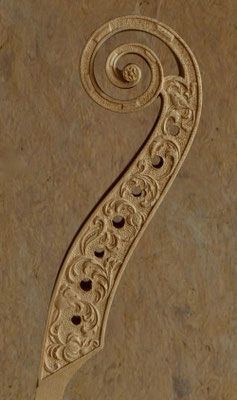 relief carving on the pegbox for a 7 string bass viol - violworks