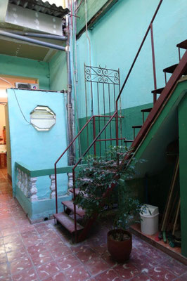 Patio on first floor with staircase to second floor