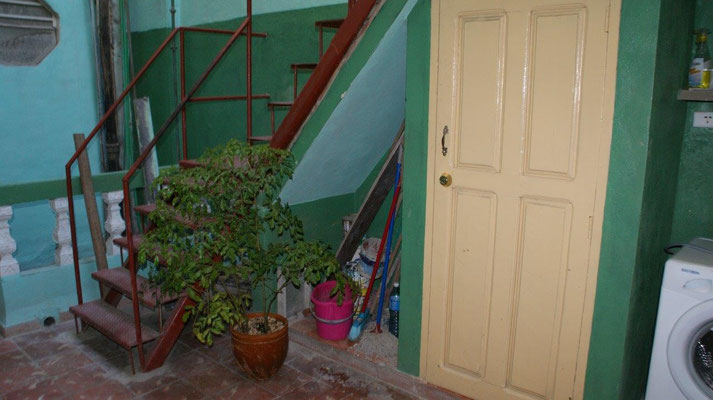 Patio on first floor with staircase to second floor