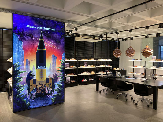 Backlit display wall at Floris van Bommel Headquarters in Moergestel, Netherlands