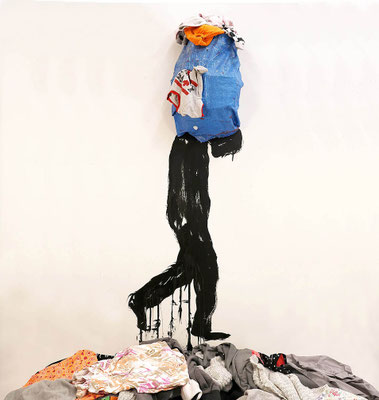 Consumerism's Shadow, 2024; used clothing and tarpaulin, acrylic, yarn, wire on gallery wall; 7in x 55in 