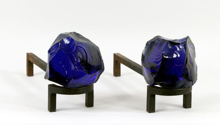 Adjugé 24 770 € - ROYERE Jean, paire de CHENETS en fer forgé et verre bleu, vers 1960