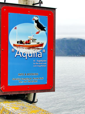 Sign at Runde harbour shows where to find the boat and how to get tickets