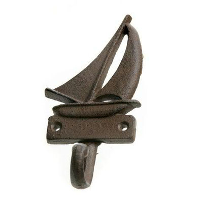 Dunkelbrauner, gusseiserner Kleiderhaken Segelboot.