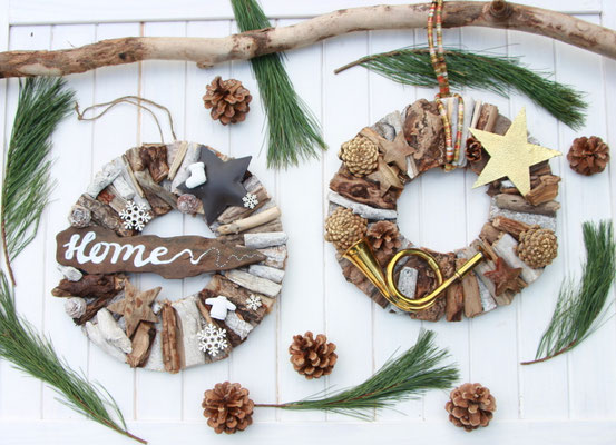 Treibholzkränze mit handgelettertem "Home" Schild in Braun- und Naturtönen mit Metallsternen und weihnachtlichen Dekoaccessoires.