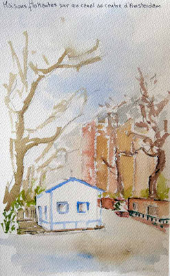Maisons flottantes sur un canal