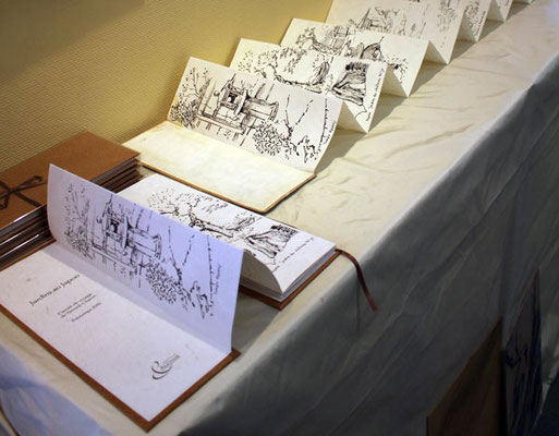 Livre et carnet d'origine dépliés