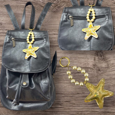 Taschenanhänger goldener Stern