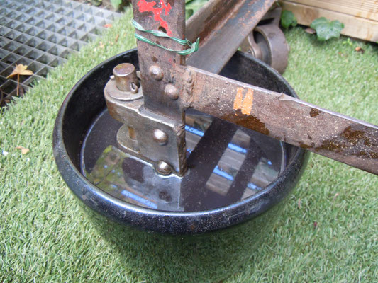 ... bathing a first wheel in coke for eco-friendly rust removal.