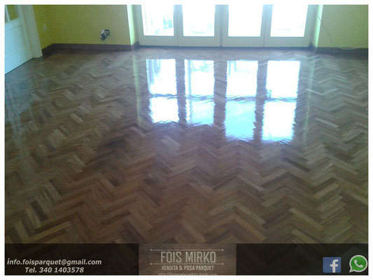 Restauro parquet in iroko posato a spina di pesce