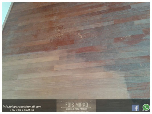 Restauro parquet in Doussie in fase di realizzazione