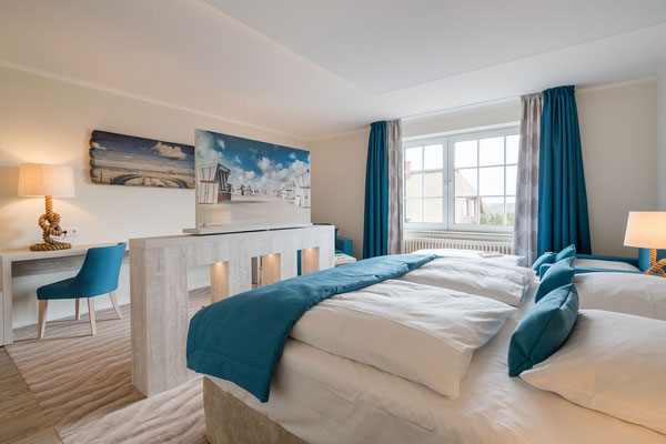 Doppelbett im Deluxe-Zimmer