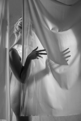 Shadows between the curtains