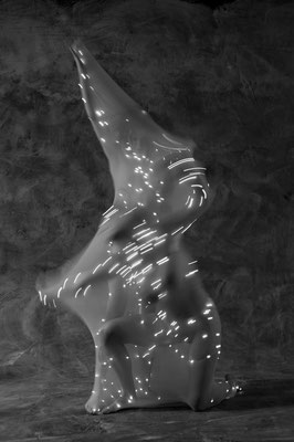 Illuminated Behind the Veil 