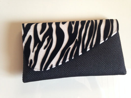 13. bag, 27 cm  x 16 cm, black, cover with zebra style, 30,- CHF