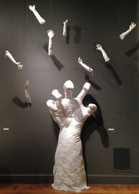 Floating desire, 2014, Hand- sewn fabric, wire, cotton, wood, 12 x 4 feet (This size is the large hand only, dimensions variable)