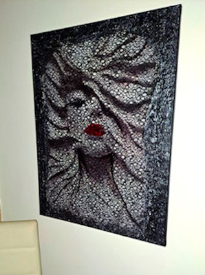 the face of a beauty mostly hidden by lace fabric which gives her something mysterious