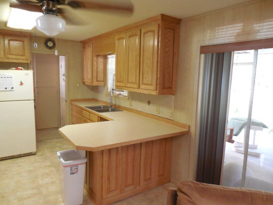 Cabinets done in Red Oak with Natural finish & Formica Countertops