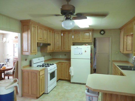 Cabinets done in Red Oak with Natural finish & Formica Countertops