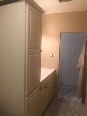 The bathrooms & laundry were painted and then a lacquer finish applied.