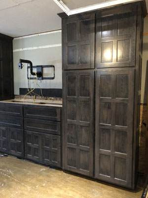 A crafter's dream!  Custom cabinets for craft supplies.  These cabinets were built with Oak and have a custom finish.