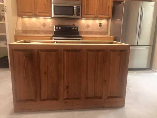  Cabinets. Cypress in kitchen. The kitchen uppers were pre-existing (survived the flood) & Jim built the replacement lowers to match. 