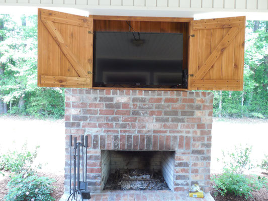 Custom built Outdoor Fireplace TV Cabinet