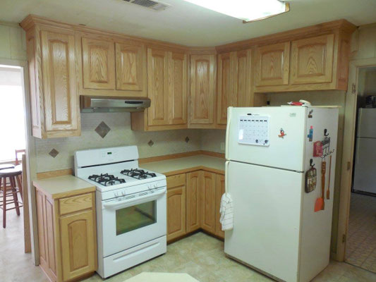 Cabinets done in Red Oak with Natural finish & Formica Countertops