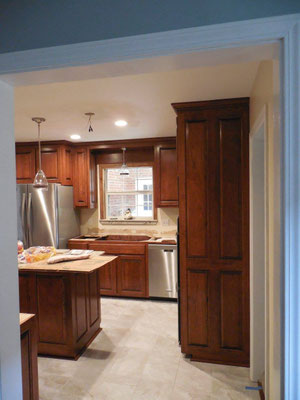 Kitchen Cabinets Cherry Raised Panels Sherwin Williams Classic Cherry stain with Medium Rub Lacquer finish