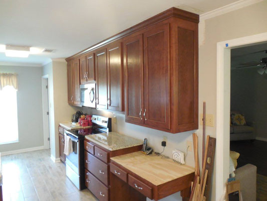   Kitchen Cabinets (before countertops) Cherry Recessed panels Sherwin Williams Classic Cherry Stain Medium Rub Lacquer Finish