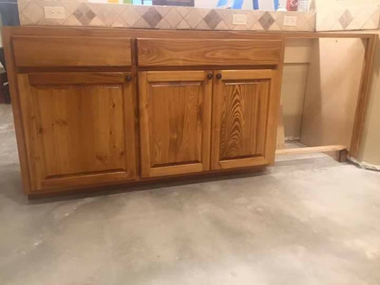  Cabinets. Cypress in kitchen. The kitchen uppers were pre-existing (survived the flood) & Jim built the replacement lowers to match. 