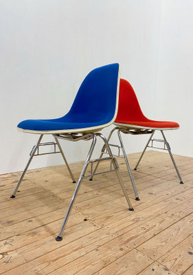 Vintage Fiberglass Side Chair DSS designed by Charles & Ray Eames in 1950 for Vitra in good vintage state, red and blue upholstery