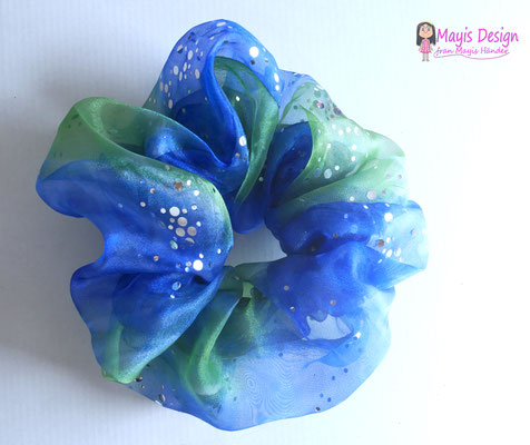 Modelo Doble "Azul Brilla". Por dentro azul liso,  por fuera organza con detalles. Precio ＄