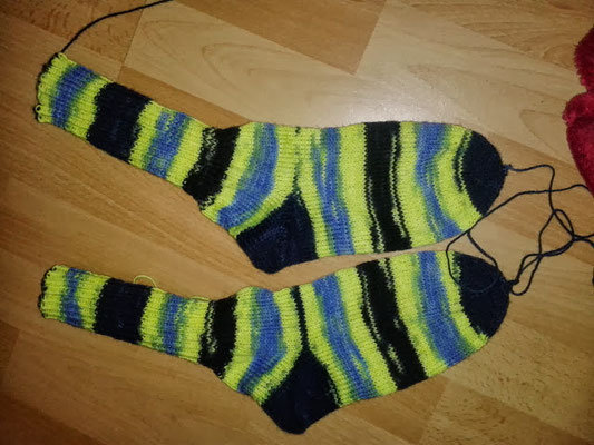 Socks with neon yellow yarn.
