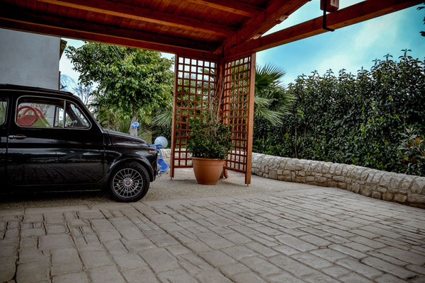 19 Posto auto con copertura / Basole e ghiaia a vista 